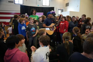 Tom Performing with Marseilles Student Body 